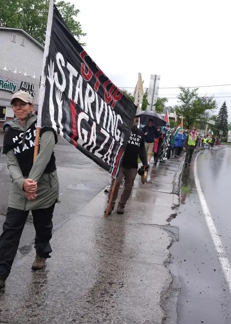 JVP VT/NH members and allies march along Rt. 2 on Saturday calling for the Israeli government to stop starving Gaza.